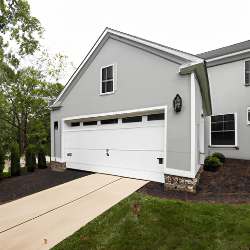 Suburban Mendham home exterior showing a modern garage door partly open, driveway, and house facade.